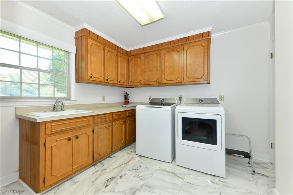 7115 Rockledge Road Whitsett, NC 27377 - Photo 7 of 49