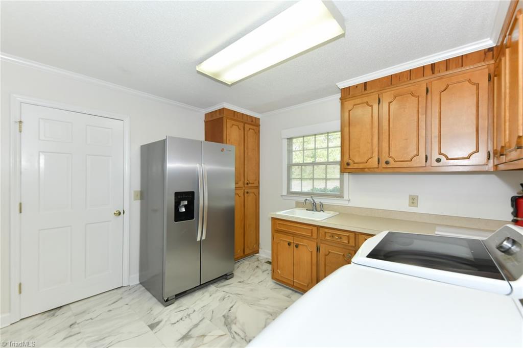 7115 Rockledge Road Whitsett, NC 27377 - Photo 8 of 49