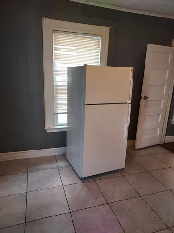 a view of storage and utility room with washer and dryer