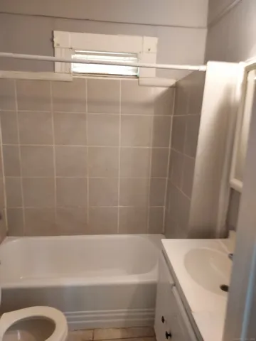 a bathroom with a sink and a bathtub