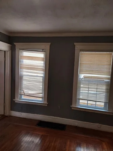 a view of a room that has a window in it