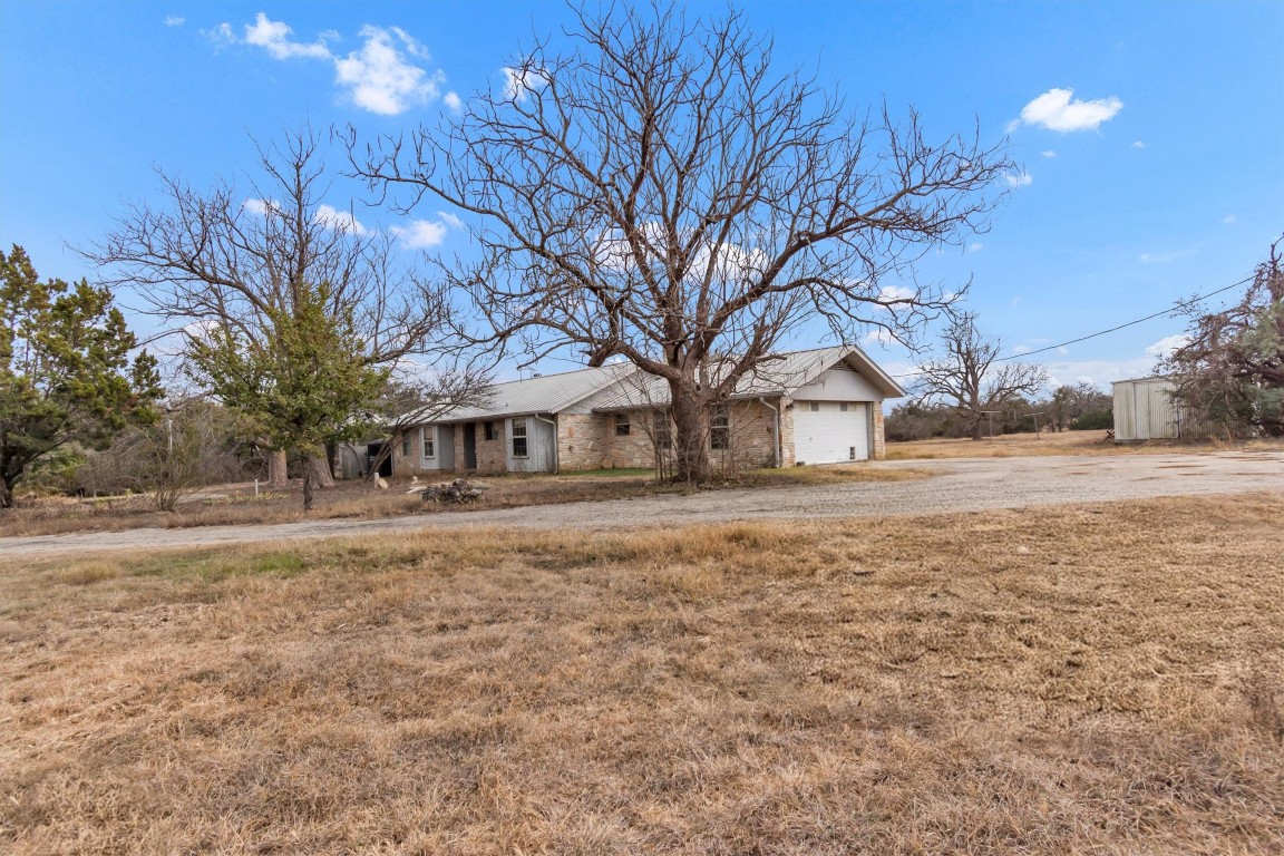 501 County Road 176 Georgetown, TX 78628 - Photo 2 of 33 a front view of a house with a yard