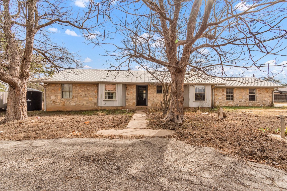 501 County Road 176 Georgetown, TX 78628 - Photo 5 of 33 a front view of a house with a large tree