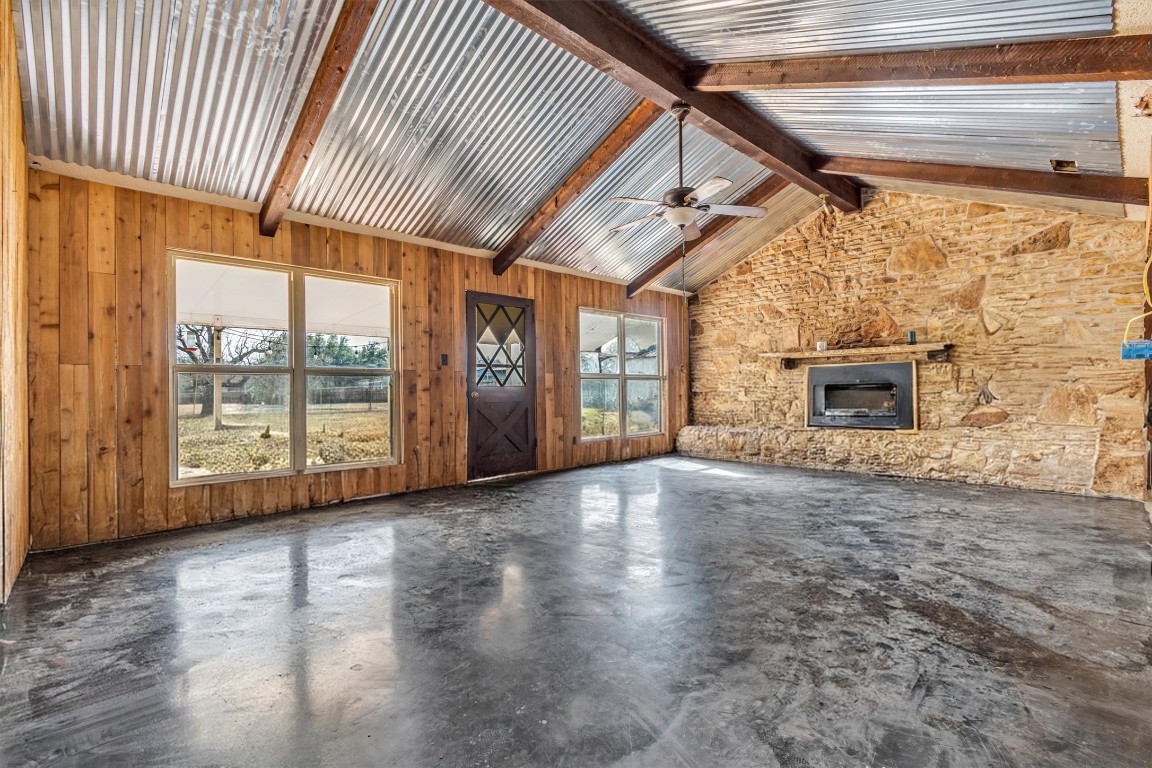 501 County Road 176 Georgetown, TX 78628 - Photo 6 of 33 a view of empty room with floor to ceiling window and fireplace