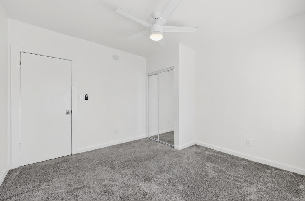 1530 East Appleton Street Long Beach, CA 90802 - Photo 31 of 61 an empty room with a ceiling fan and a window