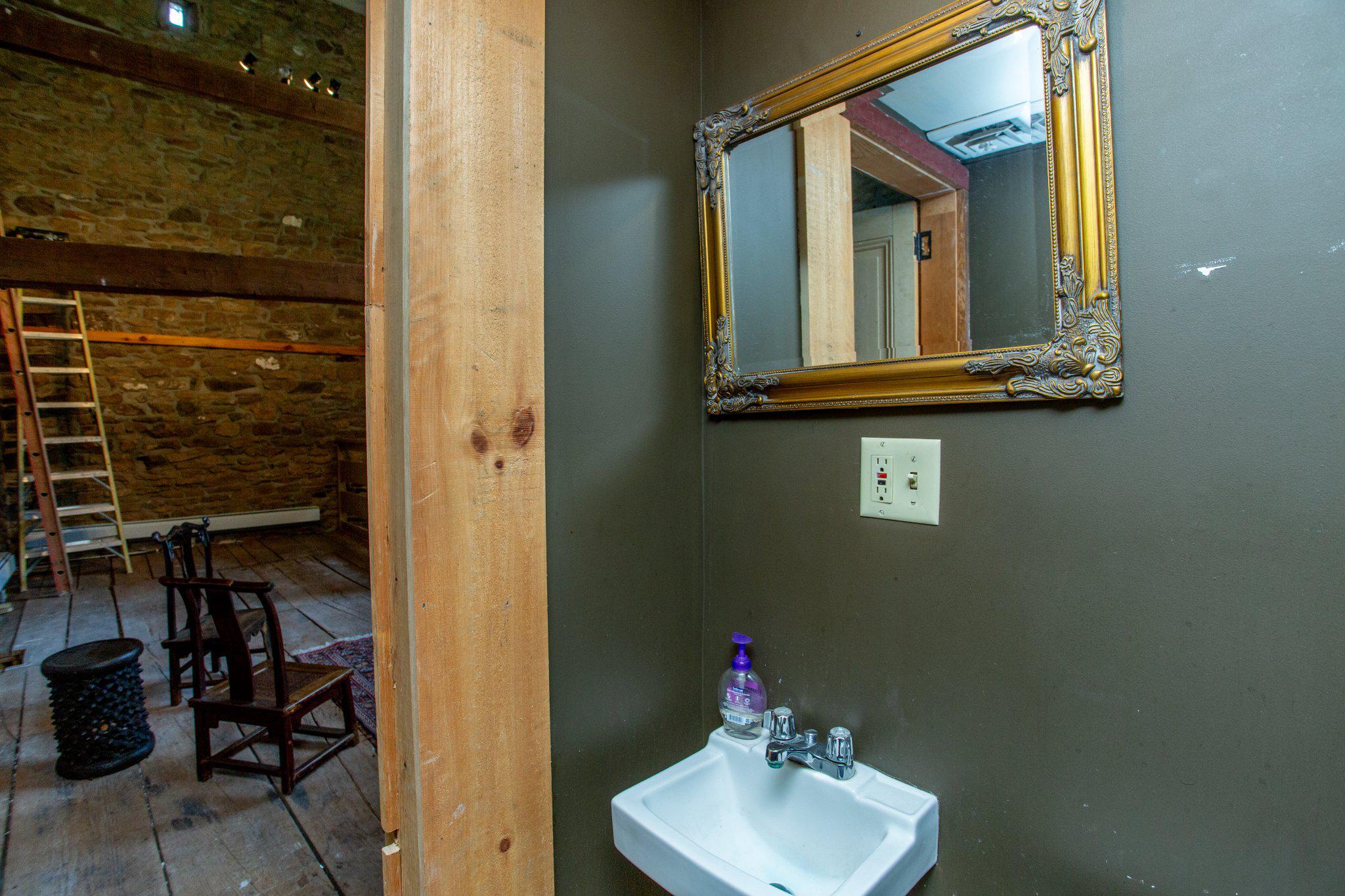 3 South Main Street Stockton, NJ 08559 - Photo 38 of 42 a bathroom with a sink and a mirror