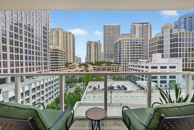 a view of balcony with furniture and outdoor seating