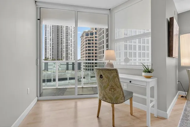 a view of balcony with furniture and outdoor view