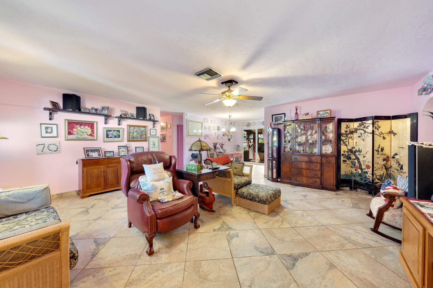 119 Bee Street Tavernier, FL 33070 - Photo 4 of 15 a living room with furniture and a flat screen tv