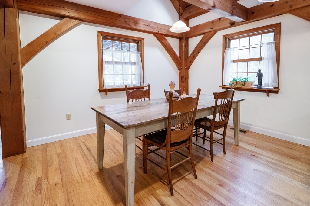 77 Swamp Road Montague, MA 01351 - Photo 15 of 35 a view of a dining room with furniture and wooden floor