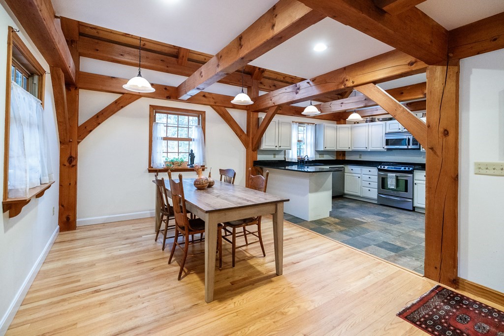 77 Swamp Road Montague, MA 01351 - Photo 16 of 35 a dinning table and chairs in a room