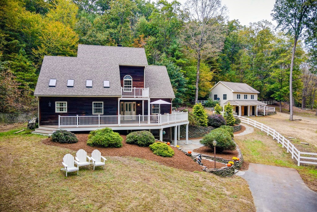 77 Swamp Road Montague, MA 01351 - Photo 2 of 35 front view of house with a yard