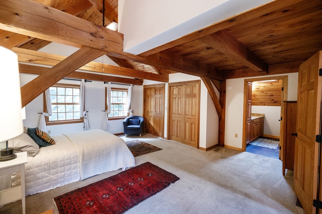 77 Swamp Road Montague, MA 01351 - Photo 23 of 35 a bed room with a bed and a window