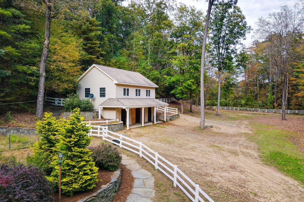 77 Swamp Road Montague, MA 01351 - Photo 29 of 35 a view of a house with a yard