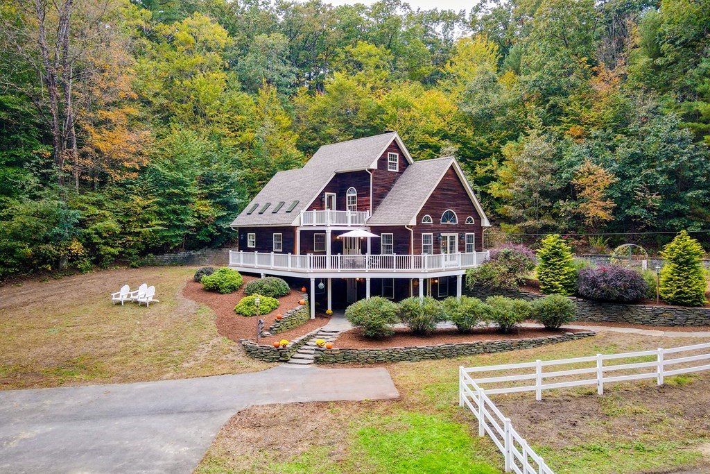 77 Swamp Road Montague, MA 01351 - Photo 3 of 35 a aerial view of a house with swimming pool next to a yard