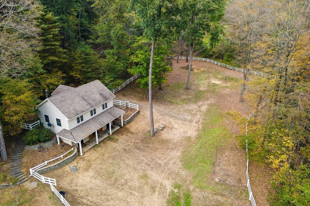 77 Swamp Road Montague, MA 01351 - Photo 35 of 35 a view of a backyard with a small deck