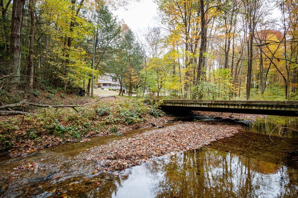 77 Swamp Road Montague, MA 01351 - Photo 8 of 35 a view of swimming pool with a yard and sitting area