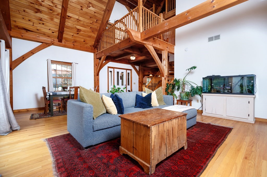 77 Swamp Road Montague, MA 01351 - Photo 9 of 35 a living room with furniture and a wooden floor