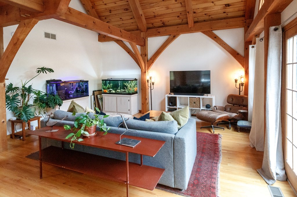77 Swamp Road Montague, MA 01351 - Photo 10 of 35 a living room with furniture and a flat screen tv