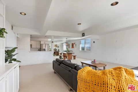 a bedroom with furniture and a couch