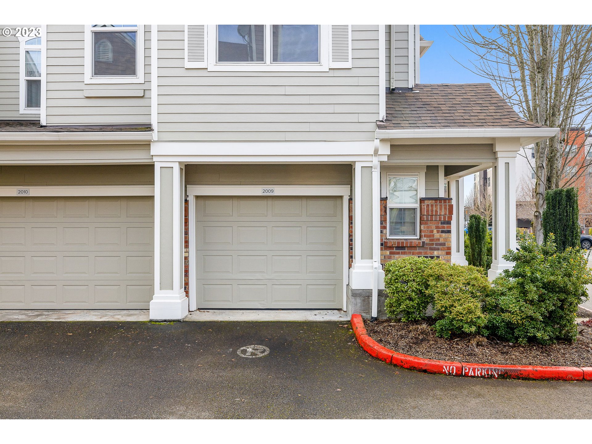 1110 Northeast 63rd Way, Unit 2009 Hillsboro, OR 97124 - Photo 22 of 31 a front view of a house