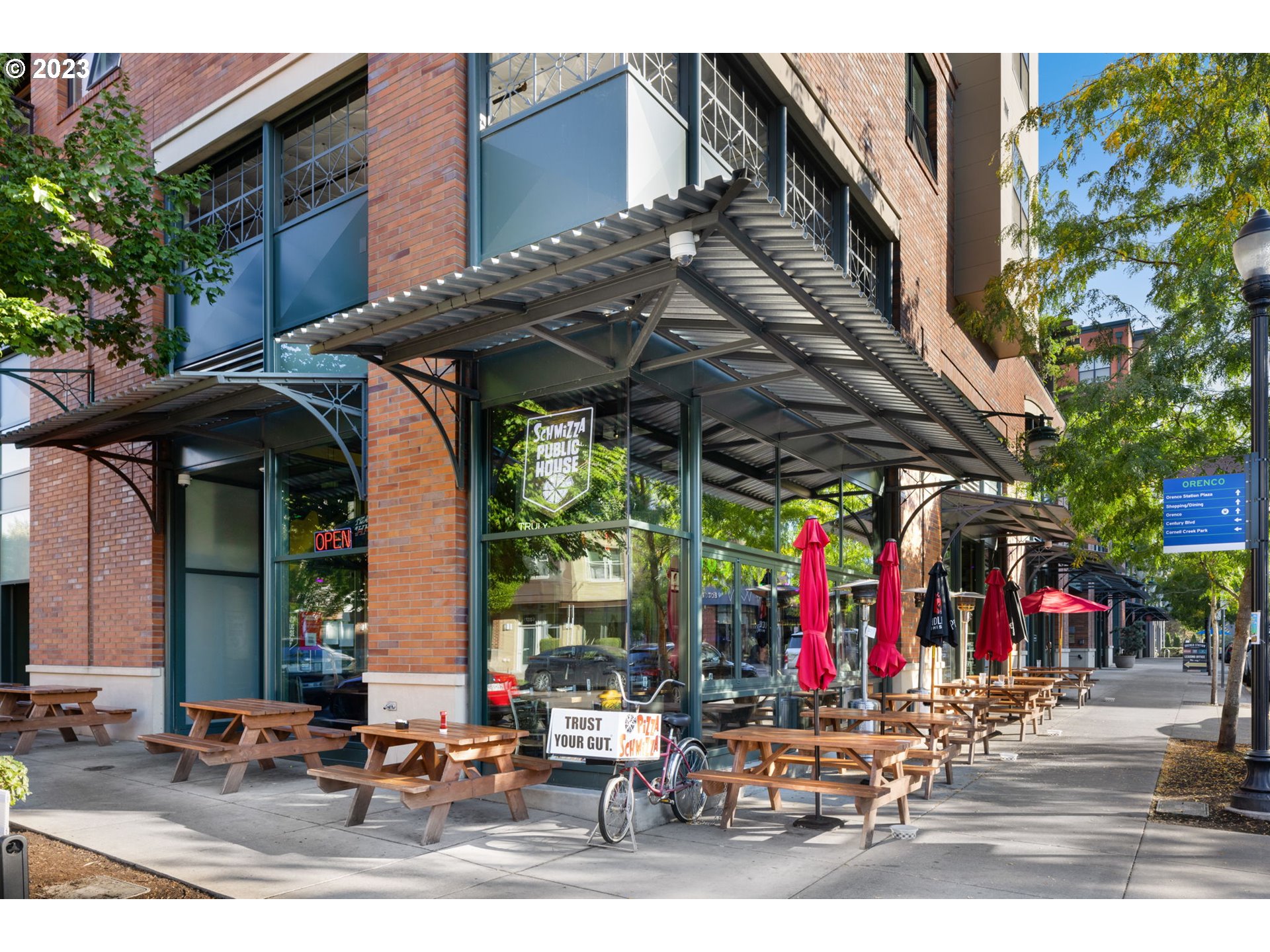 1110 Northeast 63rd Way, Unit 2009 Hillsboro, OR 97124 - Photo 29 of 31 a view of path along with retail shop and buildings