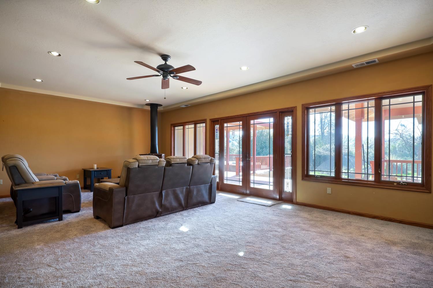 5603 Gold Mountain Road Mountain Ranch, CA 95246 - Photo 11 of 78 a living room with furniture and a floor to ceiling window