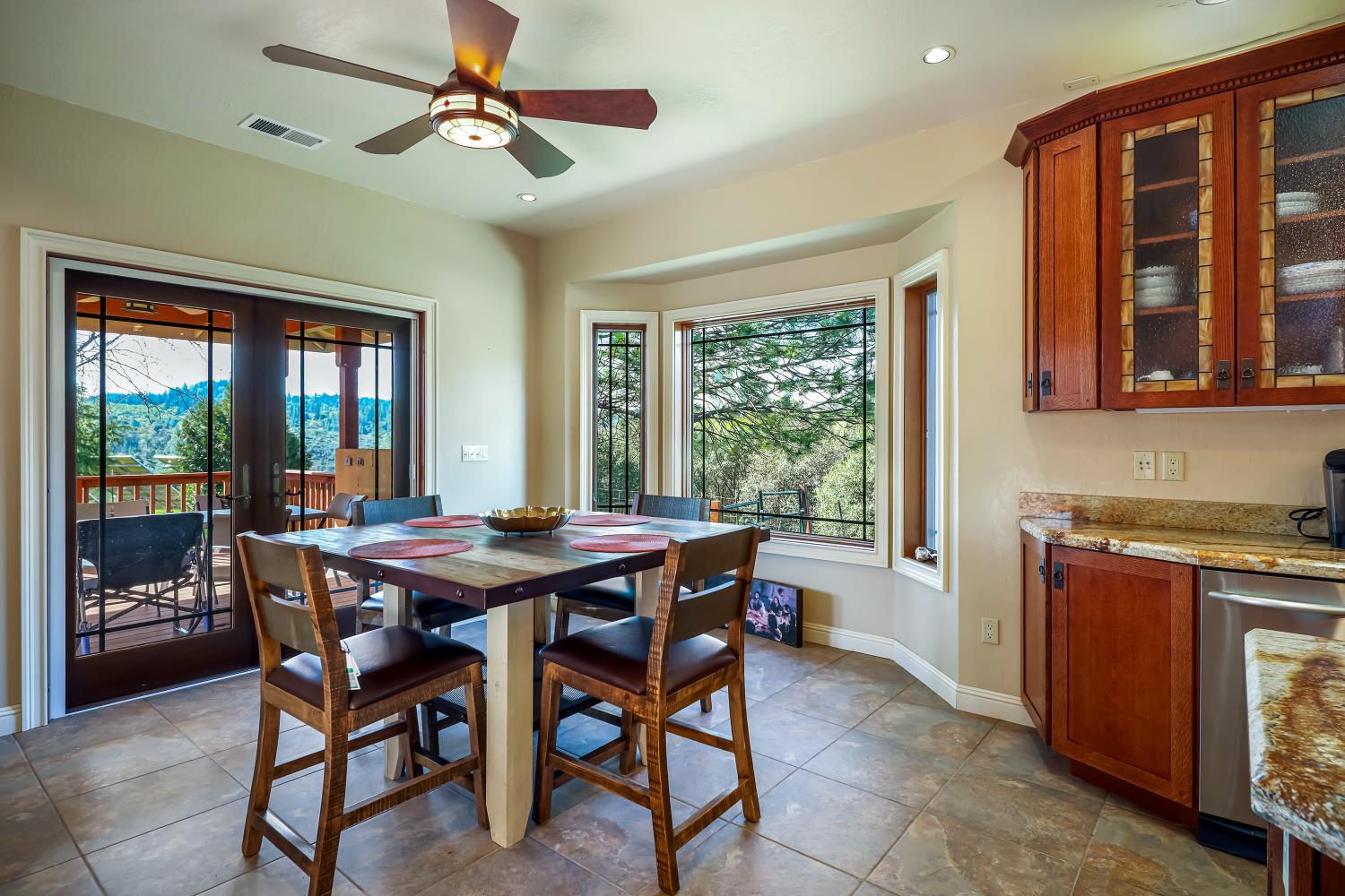 5603 Gold Mountain Road Mountain Ranch, CA 95246 - Photo 21 of 78 a view of a dining room with furniture window and outside view