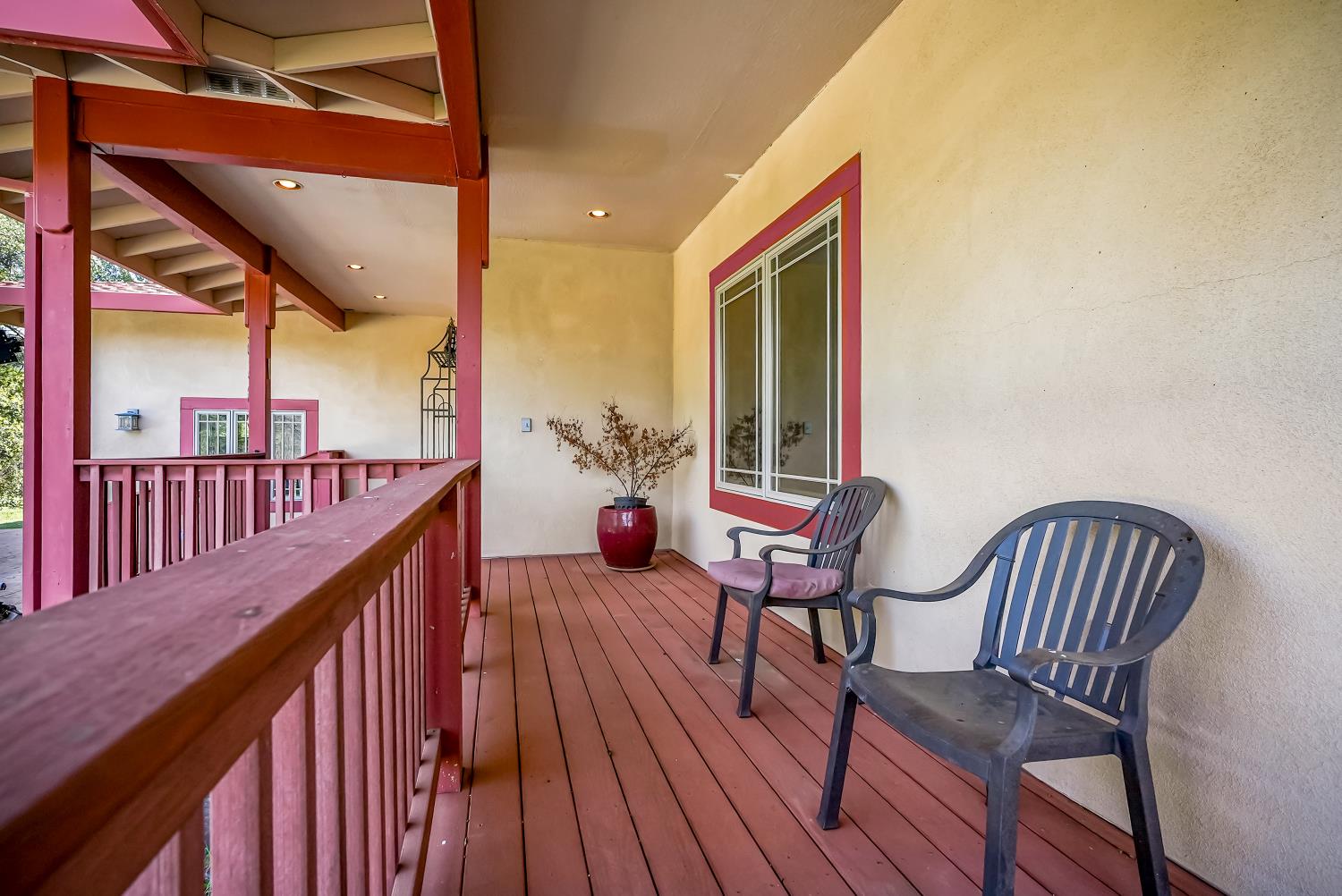 5603 Gold Mountain Road Mountain Ranch, CA 95246 - Photo 3 of 78 a balcony with wooden floor stairs and furniture