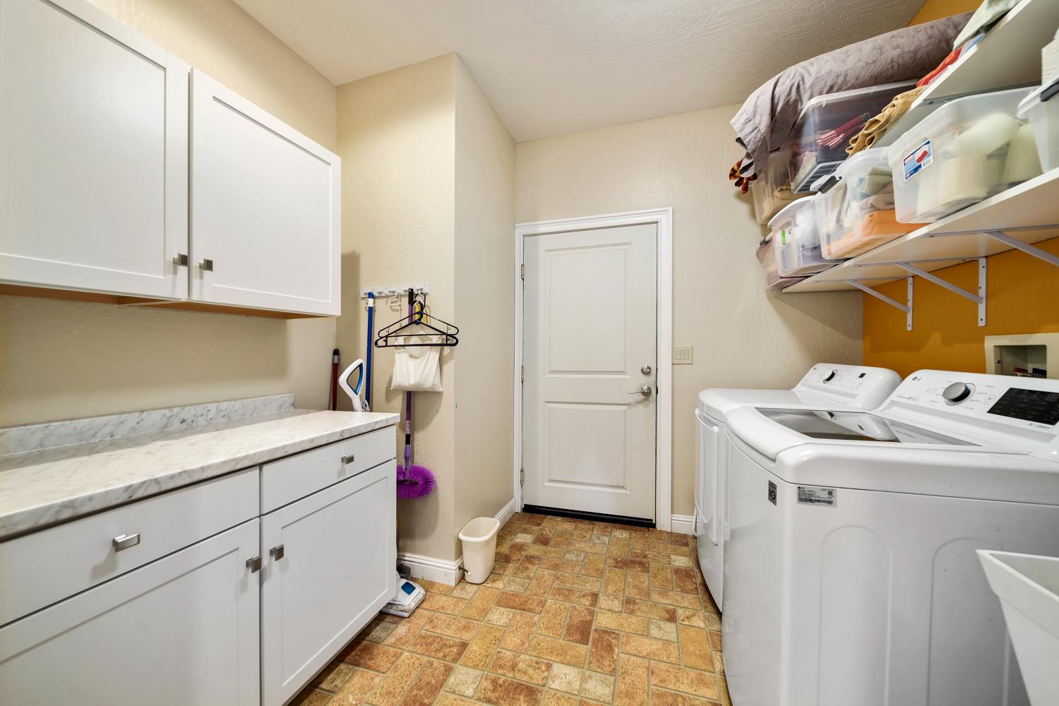 5603 Gold Mountain Road Mountain Ranch, CA 95246 - Photo 35 of 78 a room with storage and utility