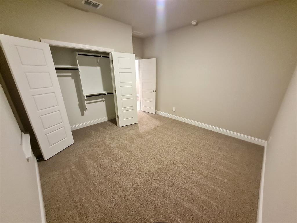 1604 Buzzard Road Denton, TX 76205 - Photo 17 of 22 Bedroom 3 in the middle of home.