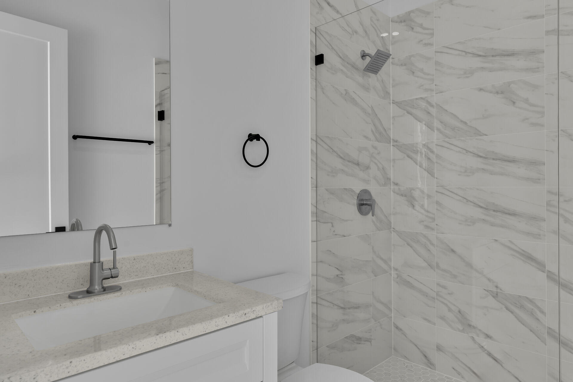 31368 Ave I Big Pine Key, FL 33043 - Photo 20 of 47 a bathroom with a sink and a mirror