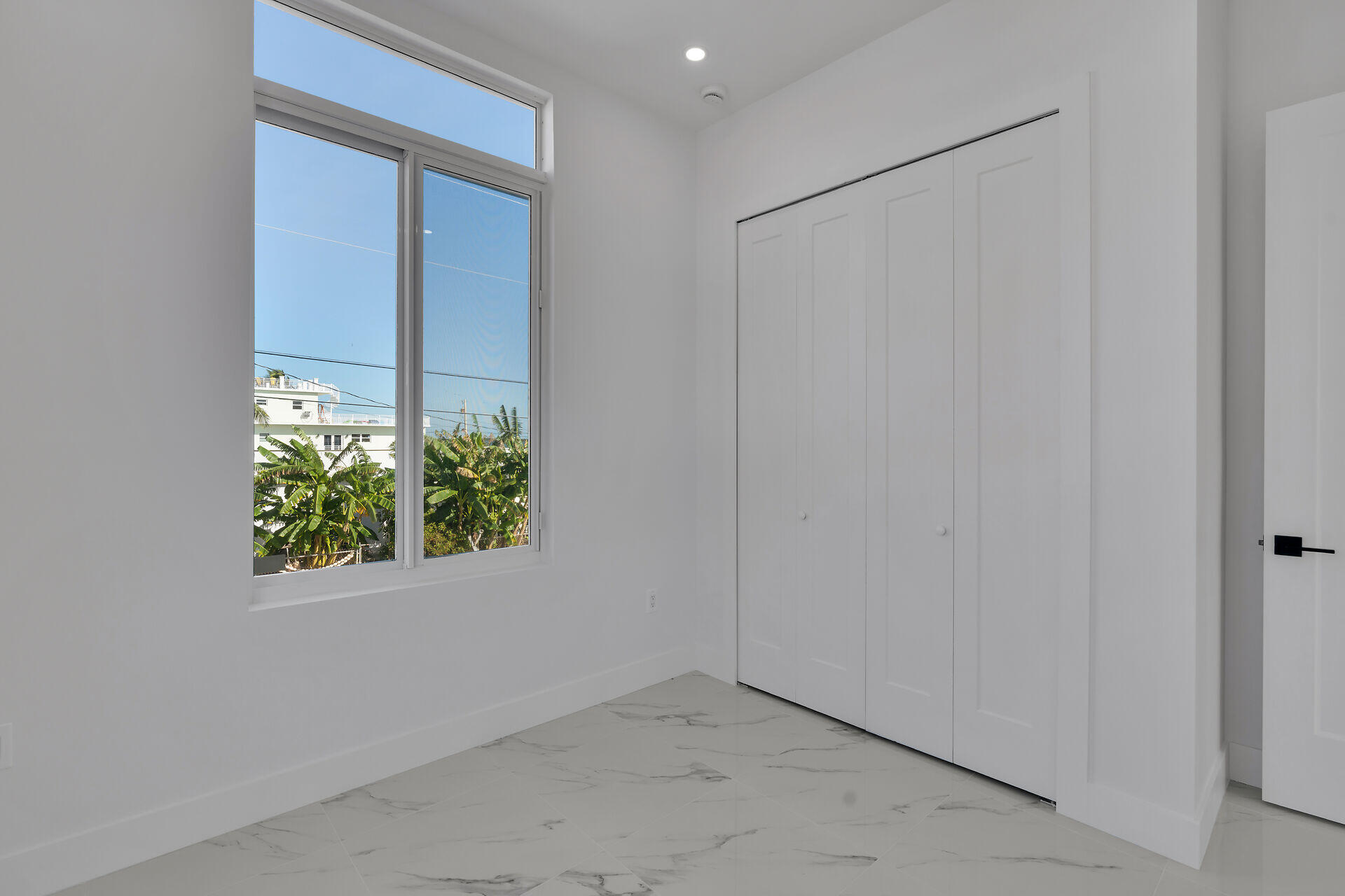 31368 Ave I Big Pine Key, FL 33043 - Photo 25 of 47 a view of an empty room with a window