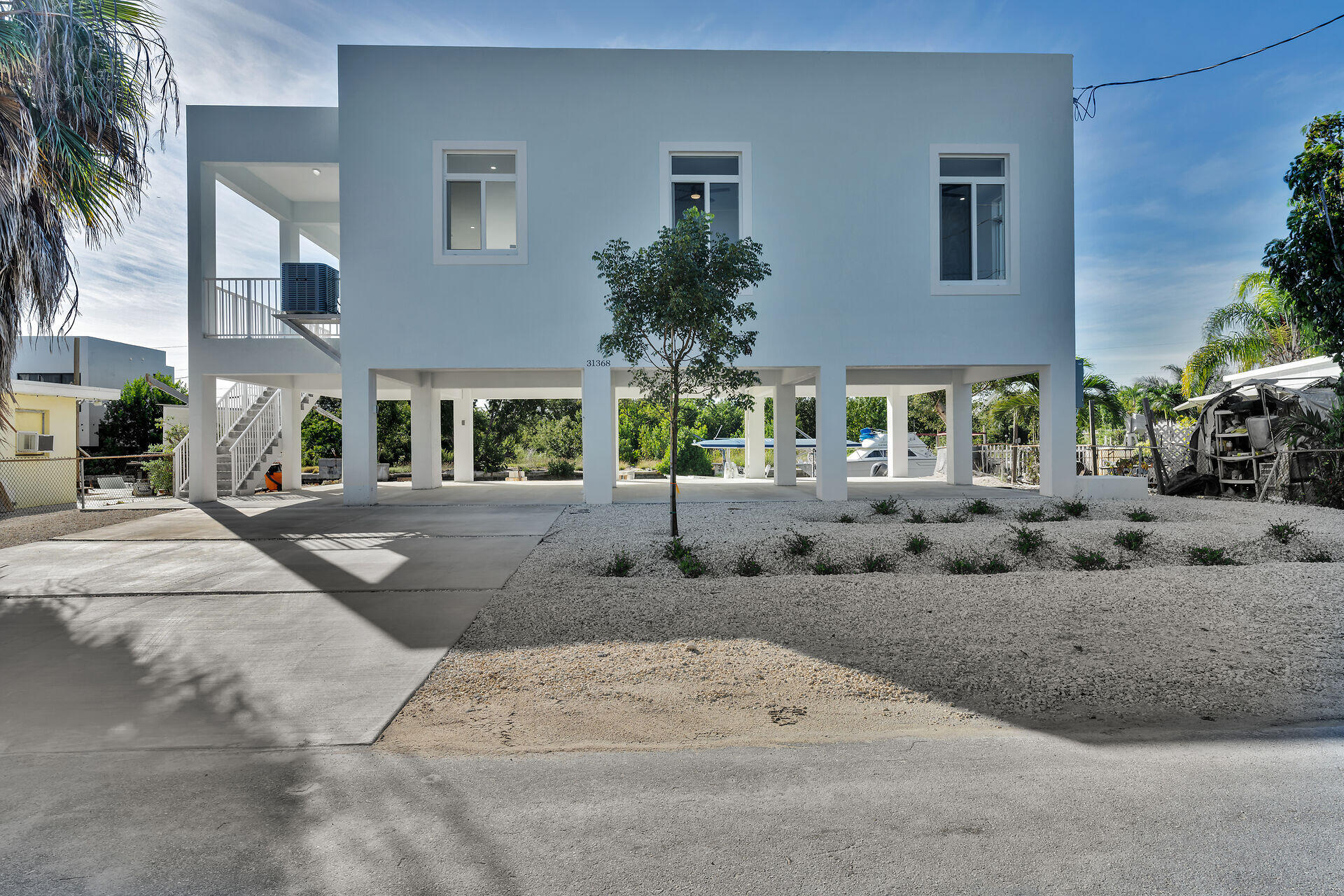 31368 Ave I Big Pine Key, FL 33043 - Photo 3 of 47 a view of a house with a street
