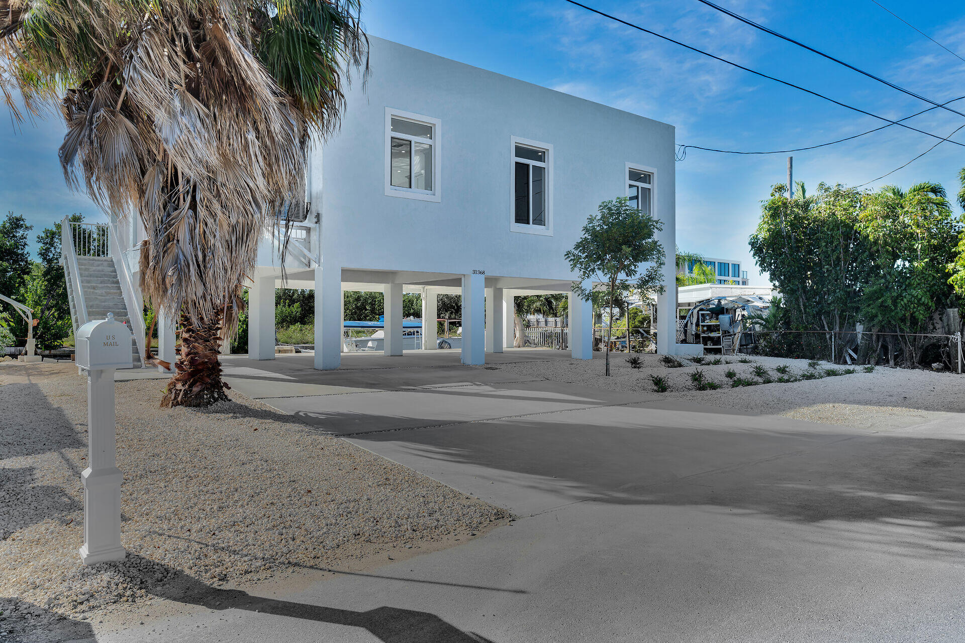 31368 Ave I Big Pine Key, FL 33043 - Photo 35 of 47 front view of a house with a street