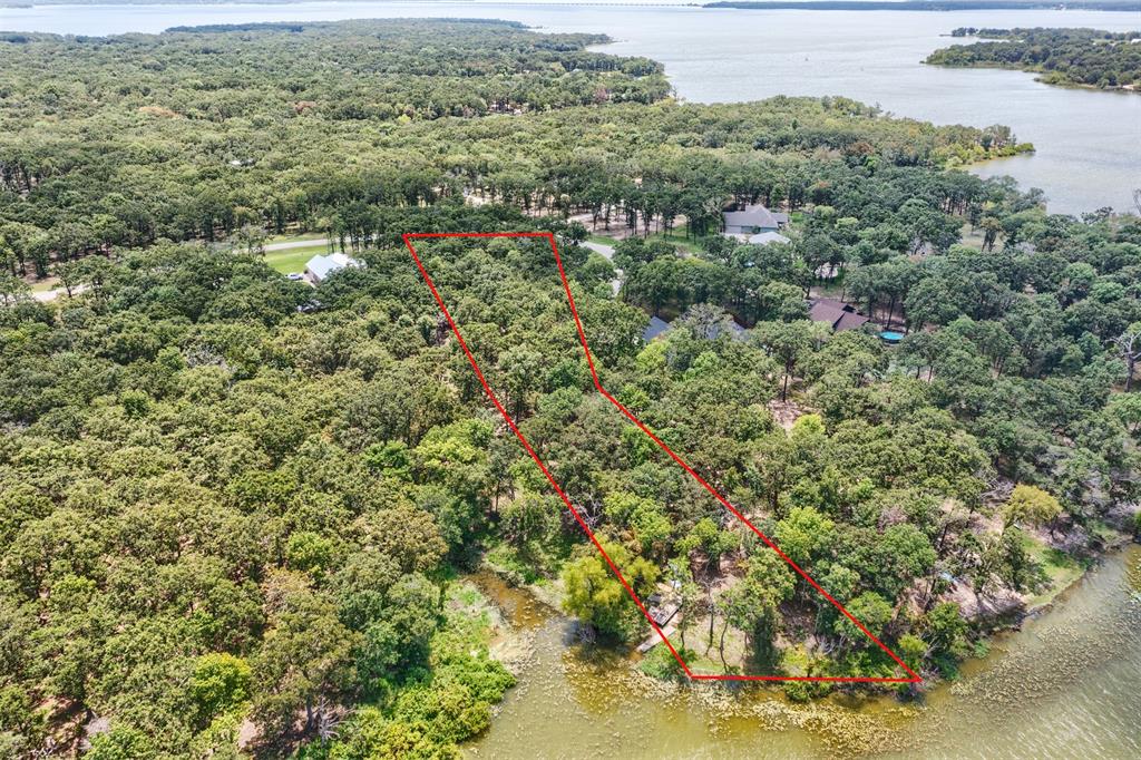 Lot 68 Anchor Point Quinlan, TX 75474 - Photo 9 of 16 Aerial view of property and surrounding area featuring a nearby body of water and property boundaries highlighted