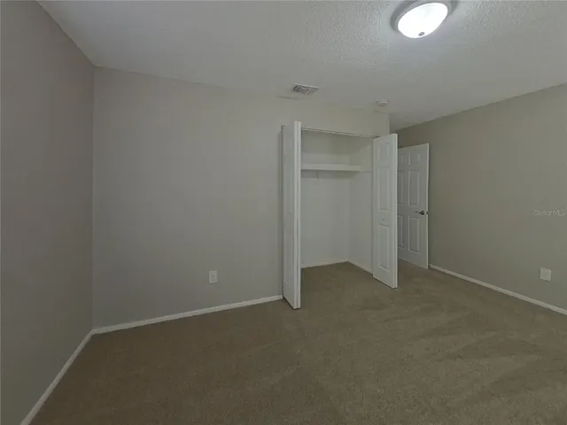 a bathroom with a bathtub and toilet