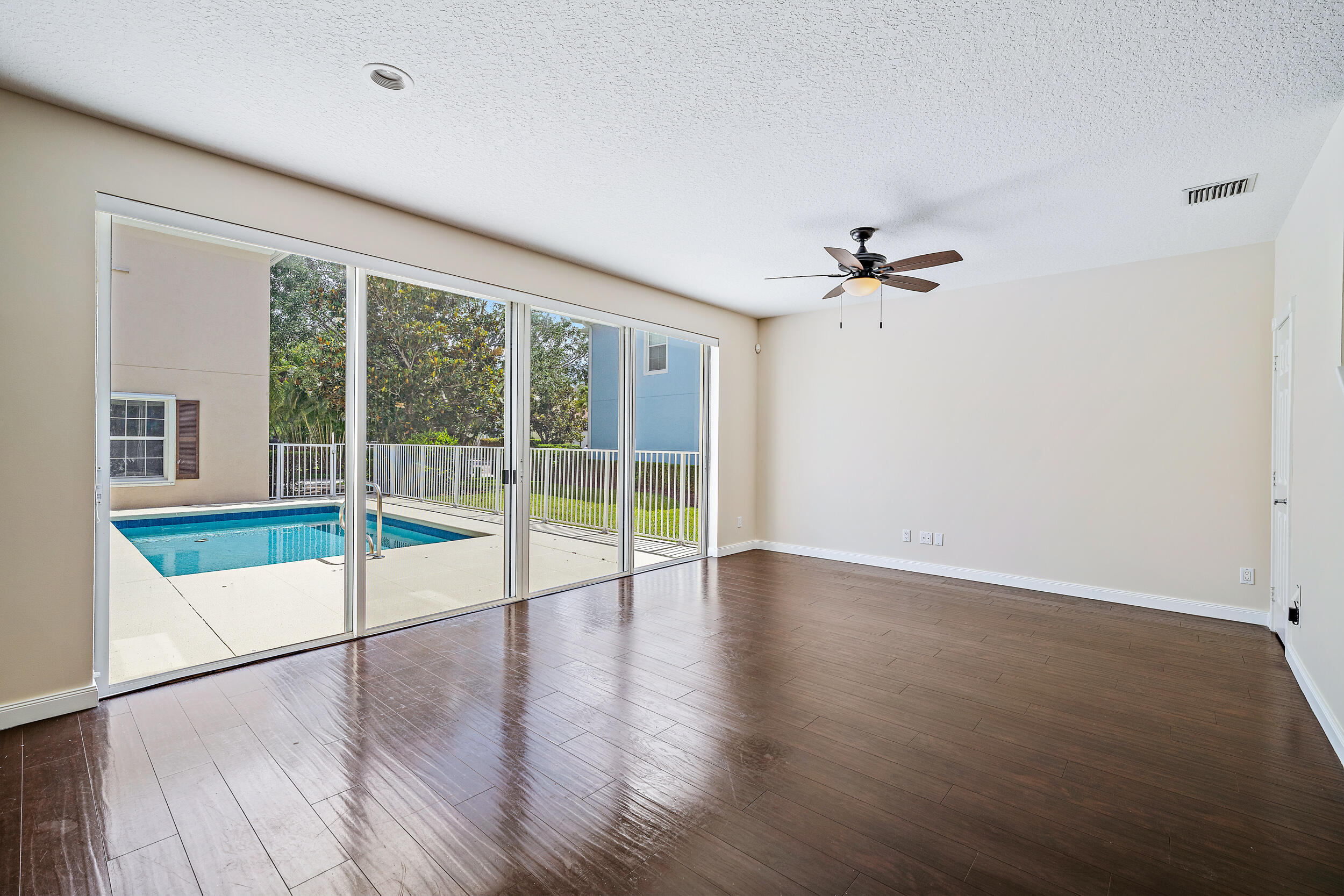 1809 Dakota Drive Jupiter, FL 33458 - Photo 11 of 25 FAMILY ROOM FACING POOL