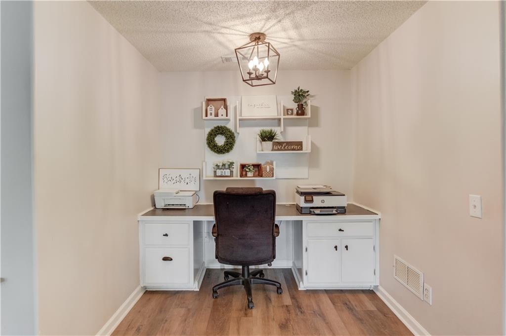 925 Nature Trail Bethlehem, GA 30620 - Photo 11 of 41 a view of workspace and wooden floor