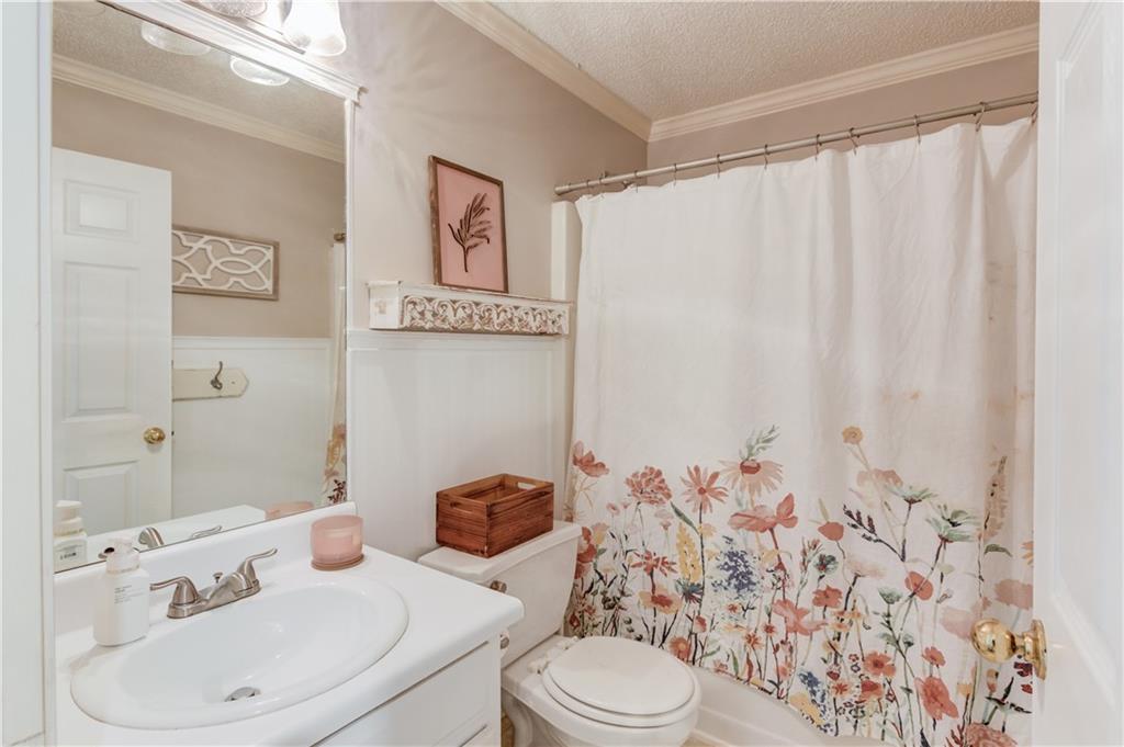 925 Nature Trail Bethlehem, GA 30620 - Photo 26 of 41 a bathroom with a sink toilet and shower