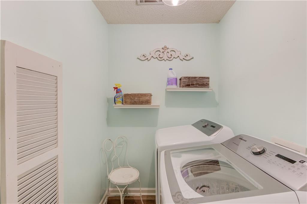 925 Nature Trail Bethlehem, GA 30620 - Photo 29 of 41 a utility room with dryer and washer
