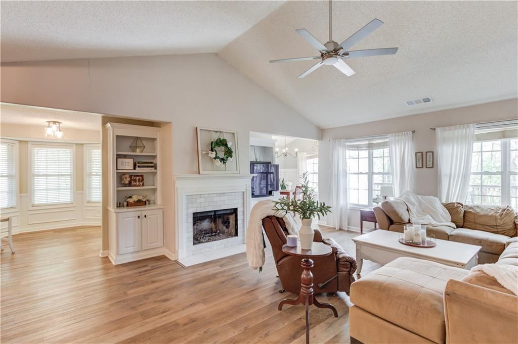 925 Nature Trail Bethlehem, GA 30620 - Photo 7 of 41 a living room with furniture fireplace and a window