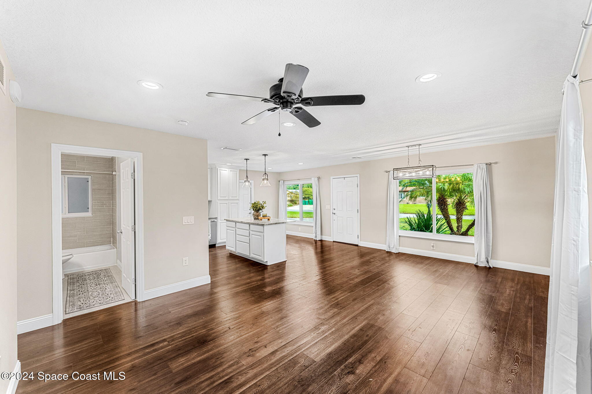 5120 Sutton Avenue Melbourne, FL 32904 - Photo 38 of 38 a view of empty room with wooden floor and fan