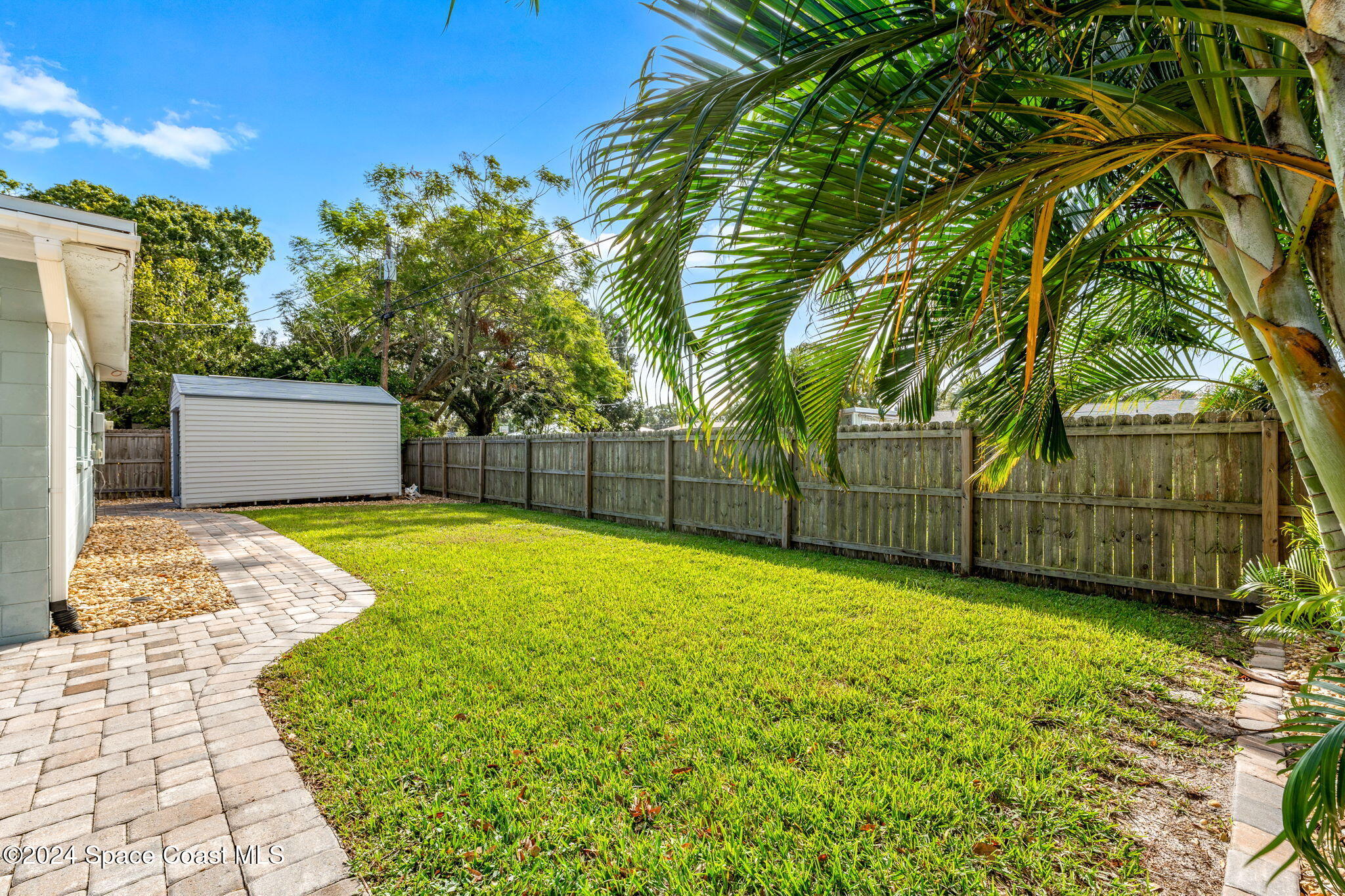 5120 Sutton Avenue Melbourne, FL 32904 - Photo 23 of 38 a view of a backyard
