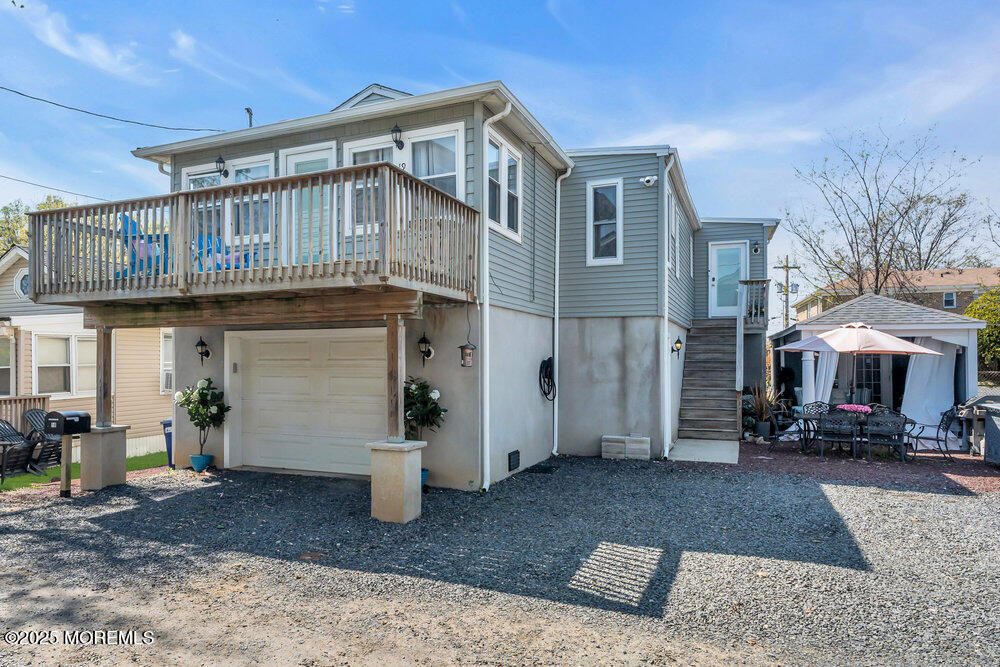 19 Gravelly Point Road Highlands, NJ 07732 - Photo 2 of 44 a front view of a house with garden