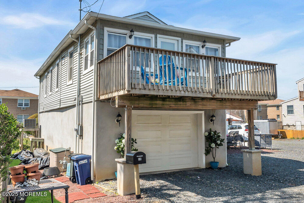 19 Gravelly Point Road Highlands, NJ 07732 - Photo 3 of 44 a front view of a house with patio