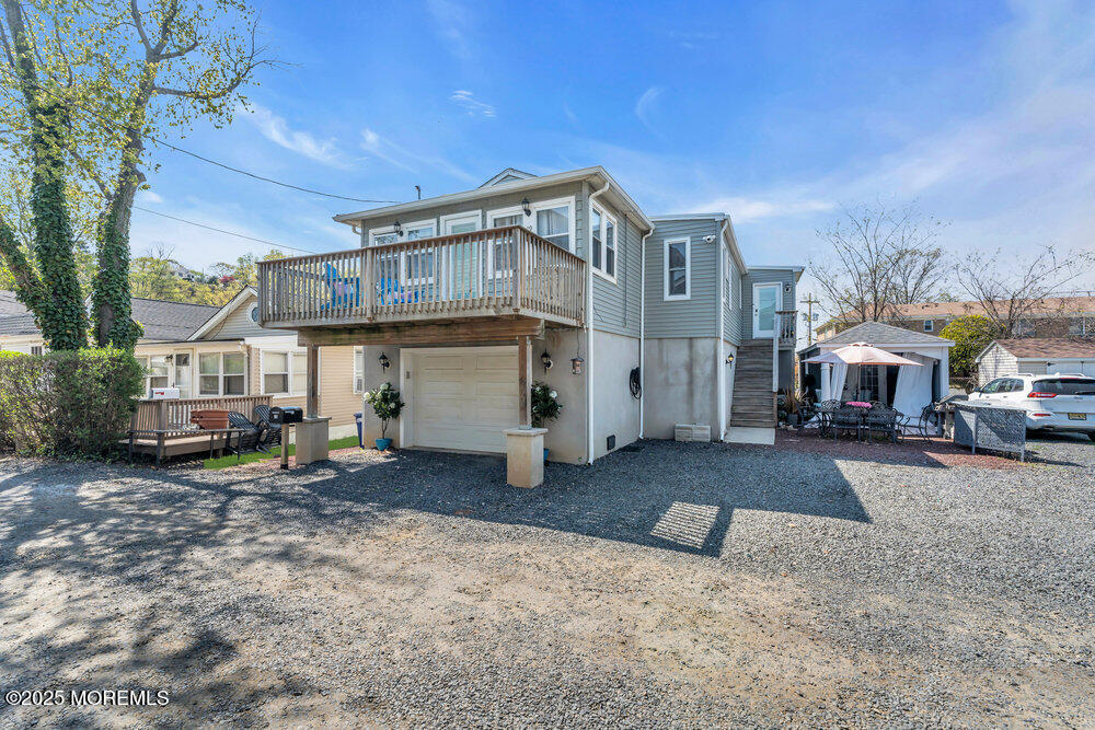 19 Gravelly Point Road Highlands, NJ 07732 - Photo 4 of 44 a view of a house with a yard