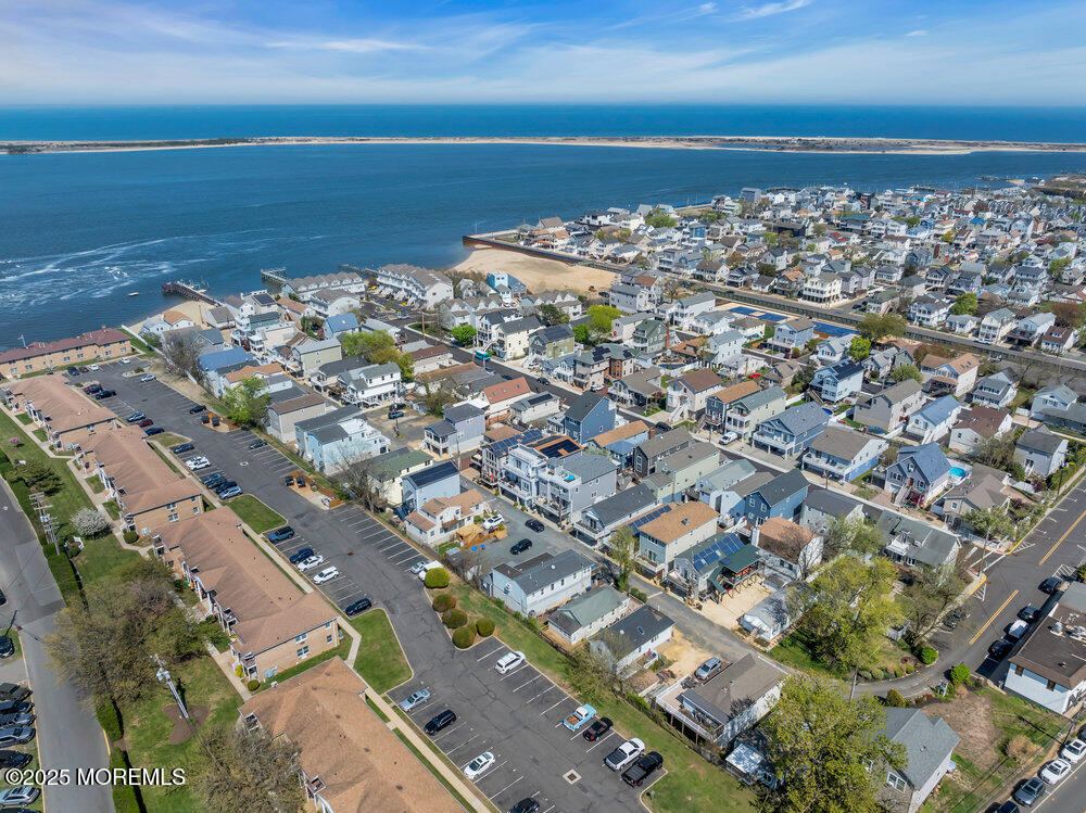 19 Gravelly Point Road Highlands, NJ 07732 - Photo 43 of 44 an aerial view of a city with ocean view in back