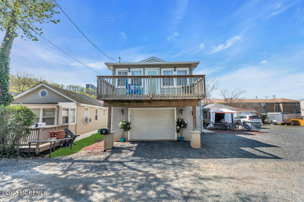 19 Gravelly Point Road Highlands, NJ 07732 - Photo 5 of 44 a view of a house with a patio