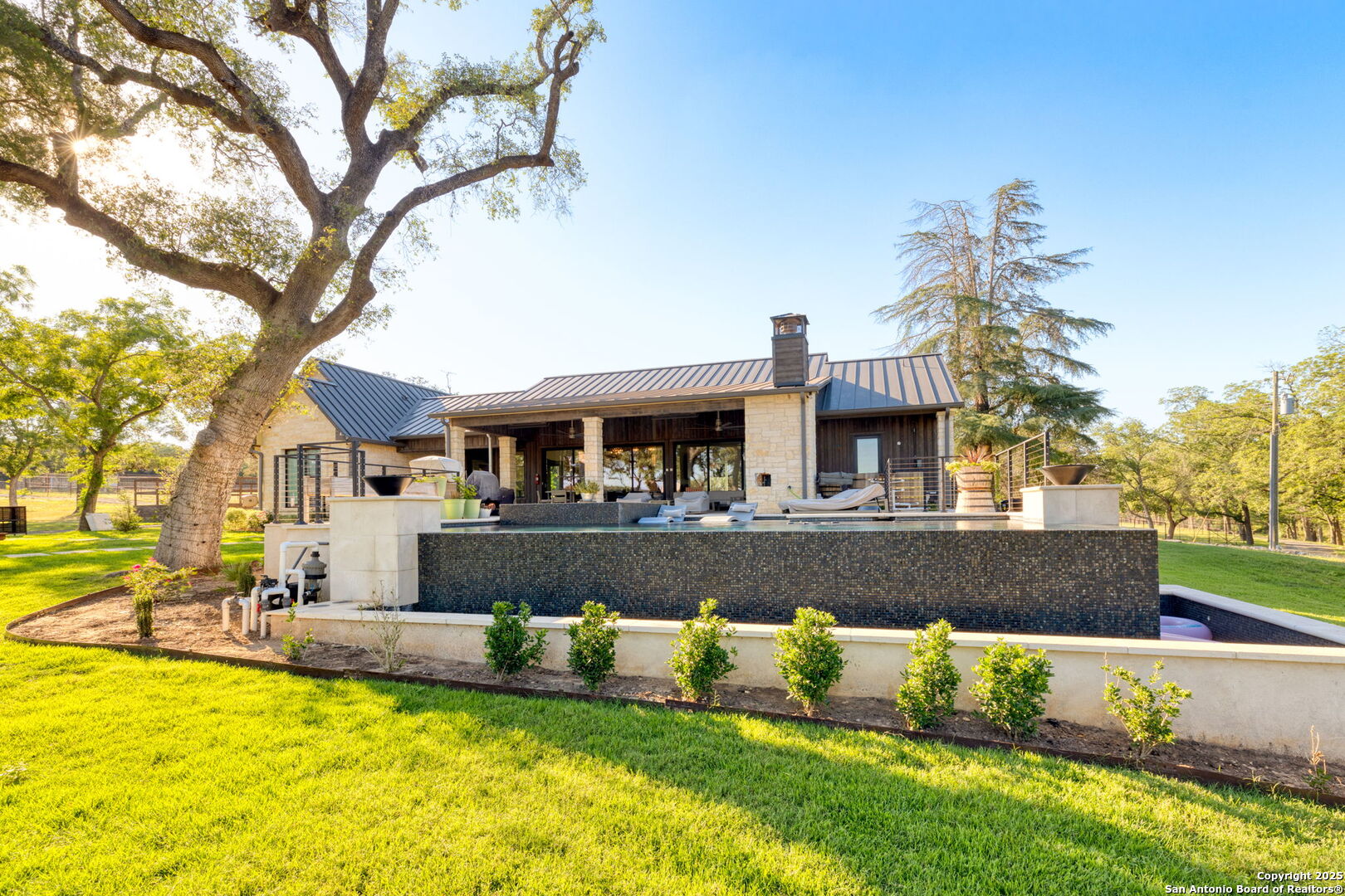 1146 Sisterdale Road Boerne, TX 78006 - Photo 29 of 94 a front view of a house with a yard